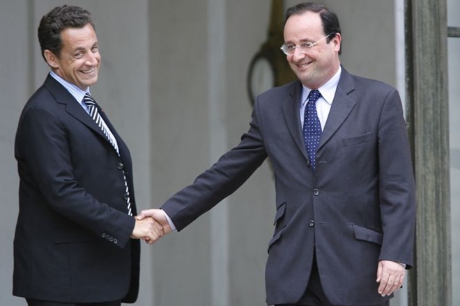 Kdo bo koga? Sarkozy levo in Hollande desno.