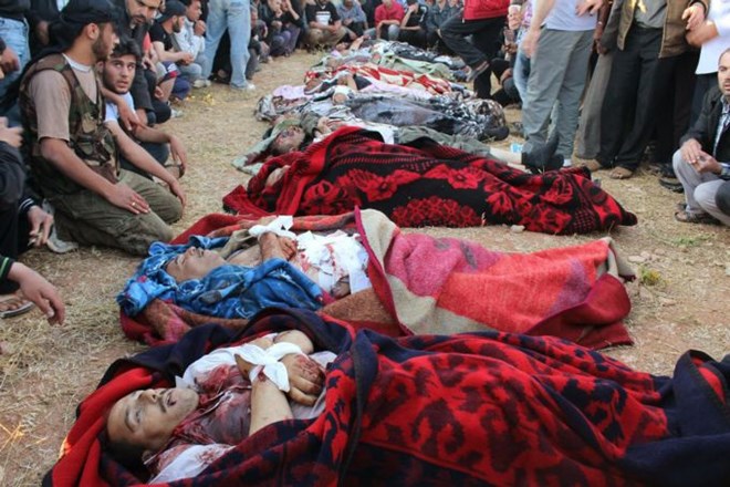 Al Asad: Sirske sile niso sodelovale pri "pošastnem" pokolu v Houlu