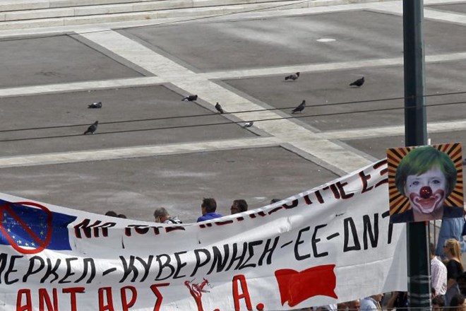 Merklova obljubila nadaljnjo pomoč Grčiji, Samaras spoštovanje zavez