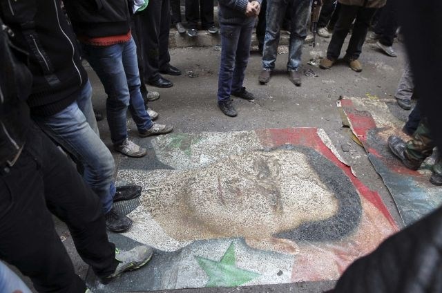 Plakat sirskega predsednika Asada. (Foto: Reuters) 
