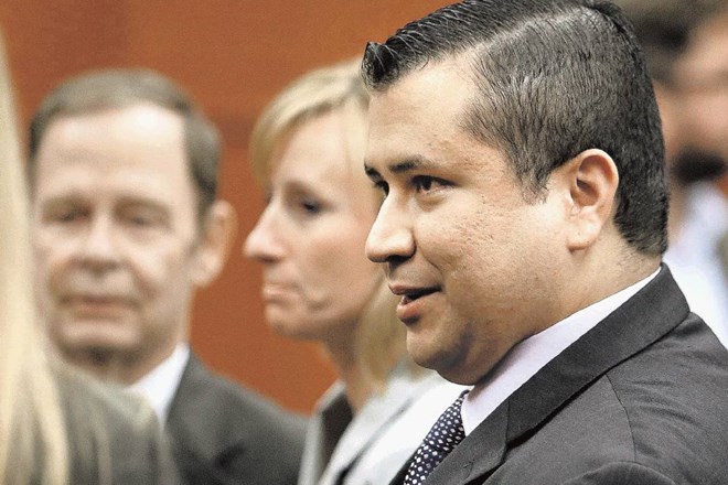 George  Zimmerman (desno)  je  ubil temnopoltega mladostnika, porota je razsodila, da je to storil v samoobrambi. 