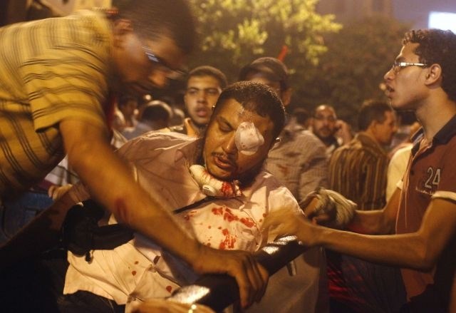 Srditi spopadi med policijo in podporniki Mursija (foto)