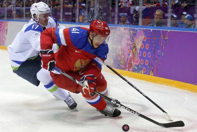 Žiga Pavlin v boju z Nikolajem Kuljominom. (Foto: Reuters) 