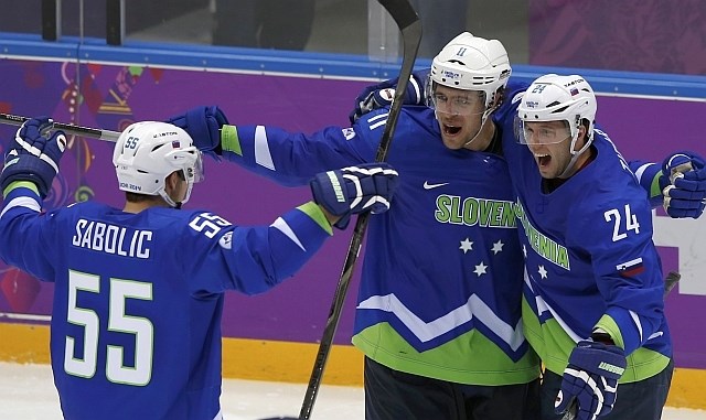 Slovenski hokejisti so se veselili odmevne zmage. (Foto: Reuters) 