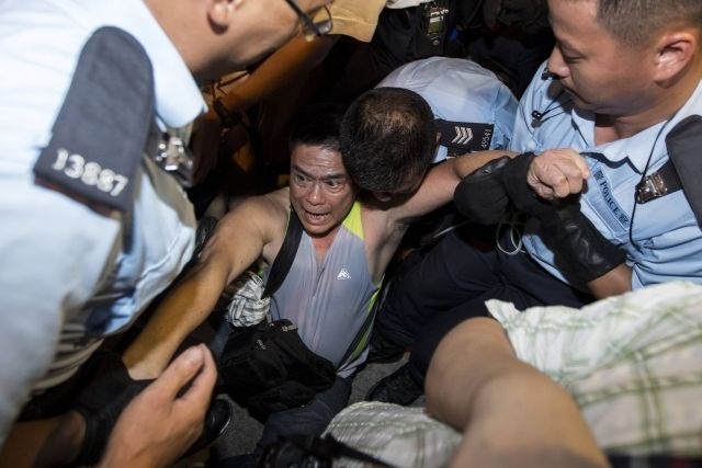 Policija po množičnih protestih v Hongkongu prijela 511 protestnikov (foto)