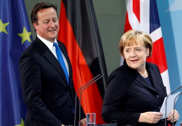 Britanski mediji so pisali o sovražnem sprejemu Cameronu v Berlinu.
