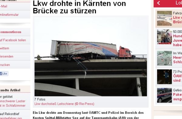 Hujša nesreča slovenskega tovornjaka v Avstriji: Prebil ograjo in obvisel