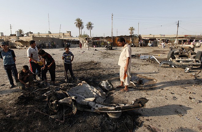 V bombnih napadih v Iraku v nedeljo umrlo najmanj 51 ljudi