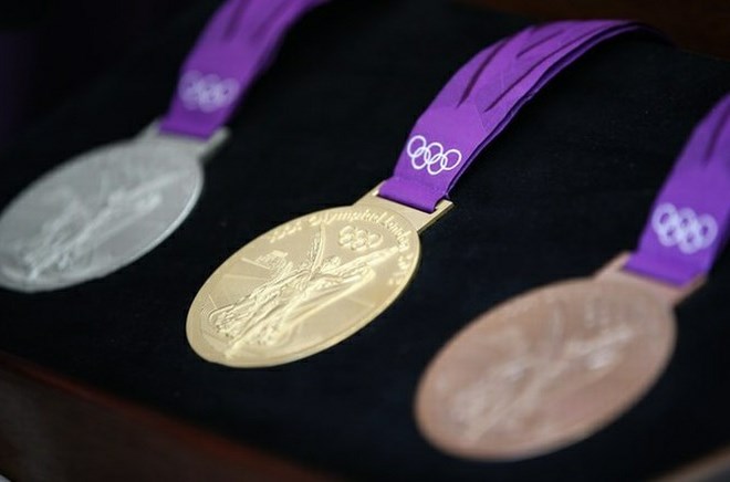 Nekatere države svojim olimpijskim šampionom obljubljajo enormne denarne nagrade