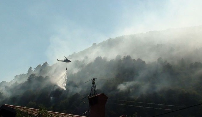 V Srbiji in BiH še divjajo požari; v Italiji in Avstriji neurja
