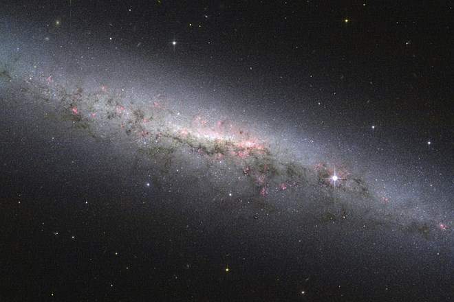 Odkrili doslej najbolj oddaljeno in najstarejšo galaksijo