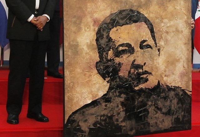 Portret venezuelskega predsednika Huga Chaveza.     