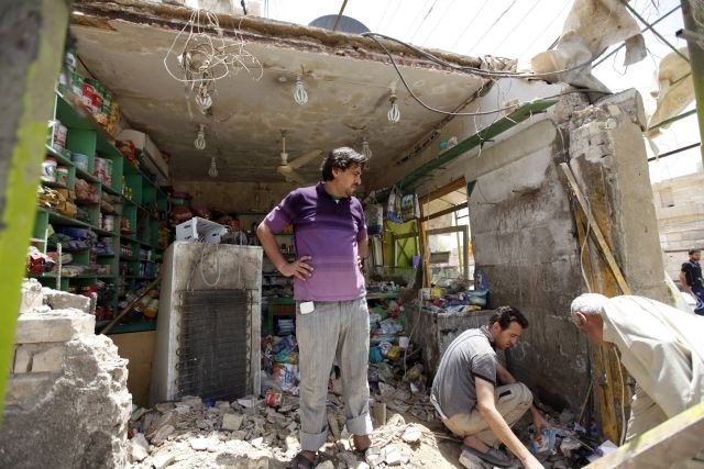 V seriji eksplozij na iraški tržnici 12 mrtvih