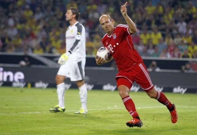 Arjen Robben je v soboto dosegel oba gola za Bayern, ki je moral v superpokalu priznati premoč Borussii (2:4). (Foto:...