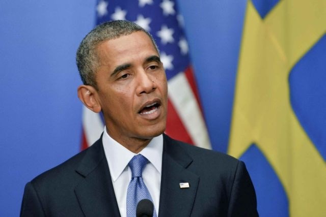 Barack Obama se mudi na obisku na Švedskem. (foto: Reuters) 