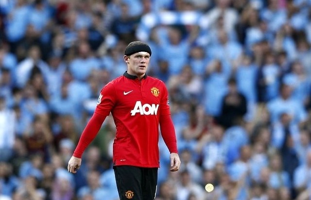 Wayne Rooney slabo prenaša letošnje uspehe Cityja in Liverpoola. (Foto: Reuters) 