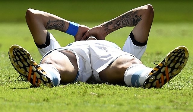 Angel di Maria je zaradi poškodbe četrtfinalno tekmo z Belgijo končal že po 33 minutah. (Foto: Reuters) 