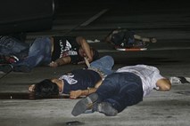 Zamaskirani strelci na letališču v Hondurasu ustrelili šest ljudi, več pa ranili