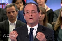 Hollande pred drugim krogom volitev zaostril retoriko glede priseljevanja