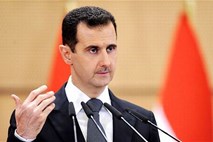 Al Asad: Sirske sile niso sodelovale pri "pošastnem" pokolu v Houlu