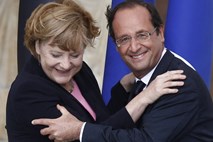 Merklova in Hollande: Nemčija in Francija bosta storili vse za zaščito območja evra