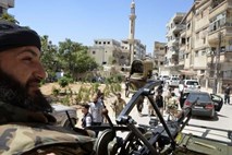 Sirski premier: Sirija bo v primeru tuje vojaške intervencije postala pokopališče za napadalce  