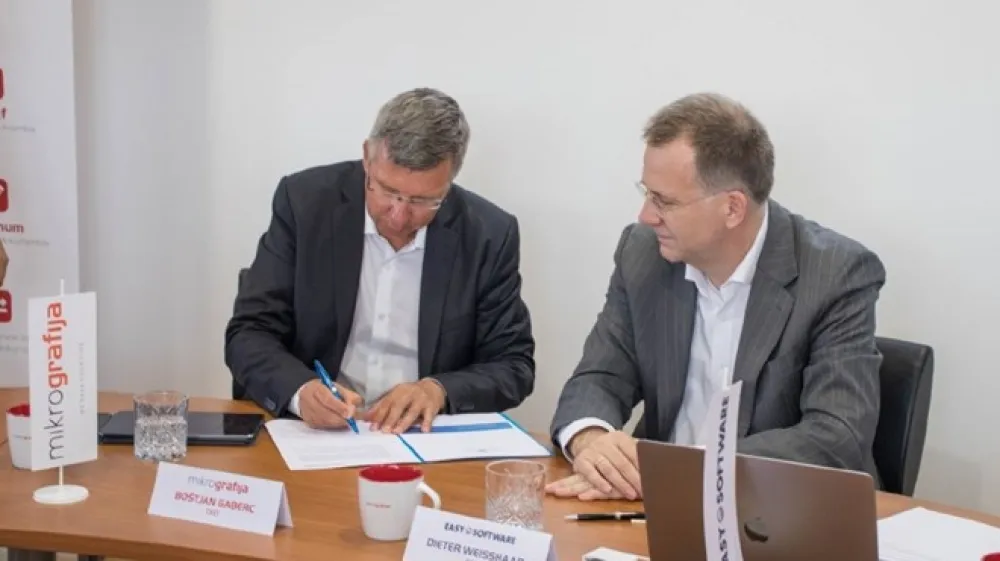 Boštjan Gaberc in Dieter Weisshaar sta podpisala pogodbo o dolgoročnem partnerskem sodelovanju.