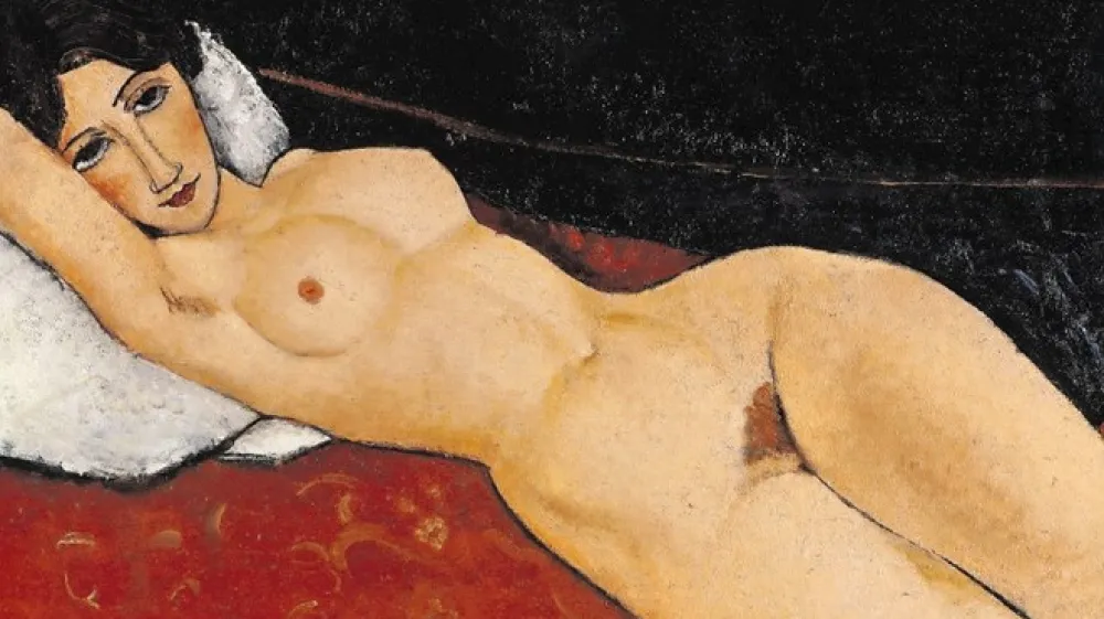 Amedeo Modigliani je zaradi  slikanja aktov doživel  policijsko  racijo in zaprtje svoje prve razstave; Gola ženska, ležeča  na blazini, okoli  1917; olje na platnu.