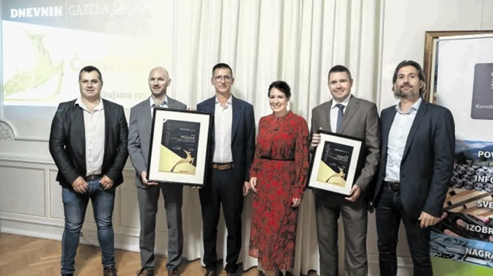 Priznanje gazela podravsko-pomurske regije 2021 sta v navzočnosti predsednika upravnega odbora Koro&scaron;ke gospodarske zbornice Bo&scaron;tjana Paradiža (prvi z leve) in direktorice Koro&scaron;ke gospodarske zbornice Katje Pokeržnik sprejela solastnika in direktorja podjetja MG Rohr  Matej Natlačen (tretji z leve) in Samo Jenič (drugi z leve). Priznanje za nominacijo sta v imenu podjetja Impedanca prevzela direktor Marko Zavr&scaron;nik (drugi z desne) in direktor Smartronika, hčerinskega podjetja Impedance, Gregor Trkaj (prvi z desne).