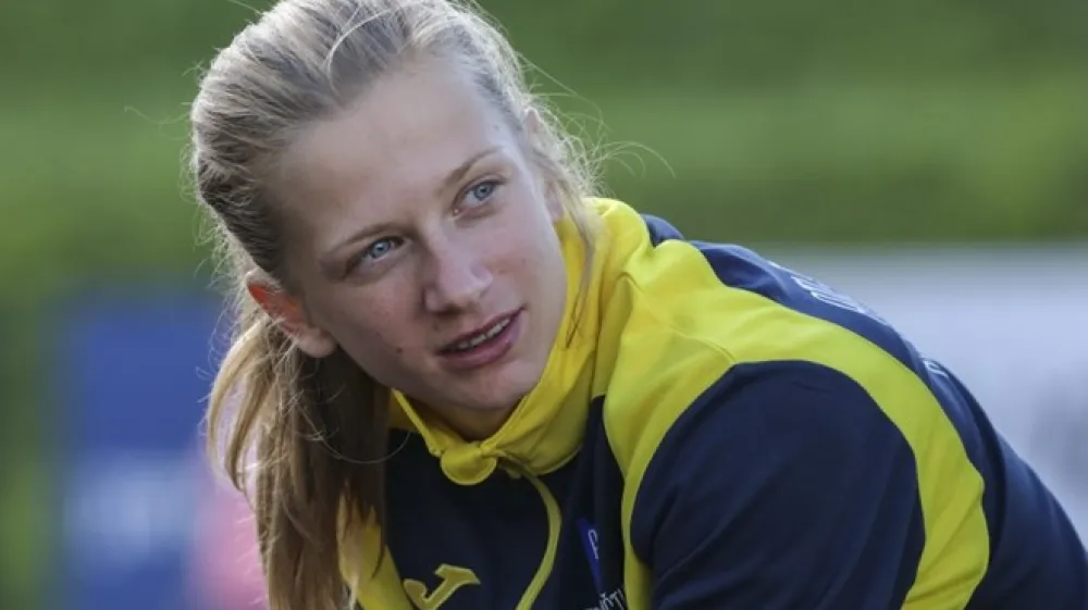 Tina &Scaron;utej, simbolična fotografija