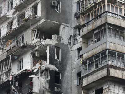 FILE PHOTO: A view shows a residential building which was damaged during Ukraine-Russia conflict in the besieged southern port city of Mariupol, Ukraine March 18, 2022. REUTERS/Alexander Ermochenko/File Photo
