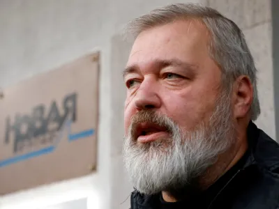 FILE PHOTO: Russian investigative newspaper Novaya Gazeta's editor-in-chief Dmitry Muratov, one of 2021 Nobel Peace Prize winners, speaks with journalists in Moscow, Russia October 8, 2021. REUTERS/Maxim Shemetov/File Photo