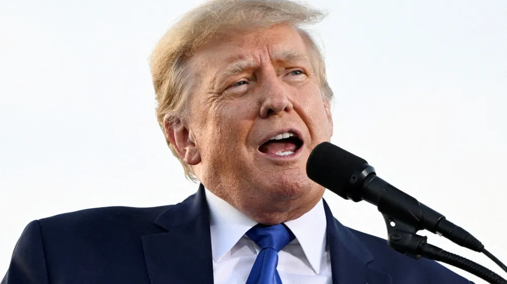 FILE PHOTO: Former U.S. President Donald Trump speaks during a rally to boost Ohio Republican candidates ahead of their May 3 primary election, at the county fairgrounds in Delaware, Ohio, U.S. April 23, 2022. REUTERS/Gaelen Morse/File Photo