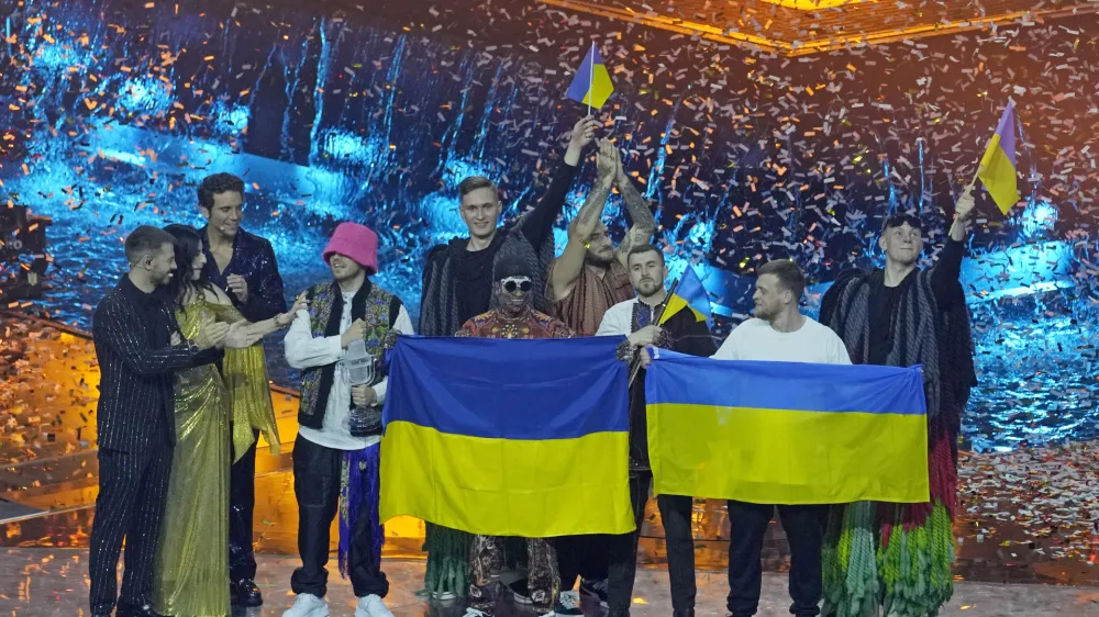Kalush Orchestra from Ukraine stand on the stage after winning the Grand Final of the Eurovision Song Contest at Palaolimpico arena, in Turin, Italy, Sunday, May 15, 2022. (AP Photo/Luca Bruno)