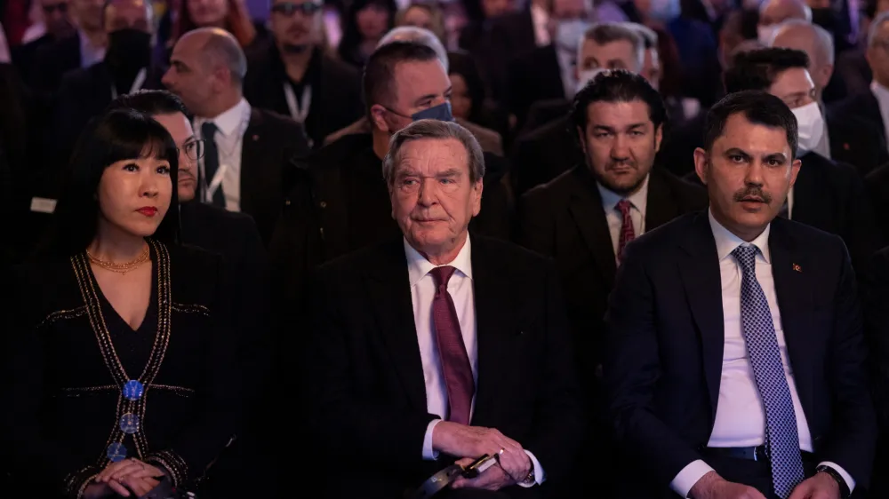 Former German Chancellor Gerhard Schroder and his wife So-yeon Schroder-Kim attend a business forum in Kocaeli, Turkey, March 24, 2022. REUTERS/Umit Bektas