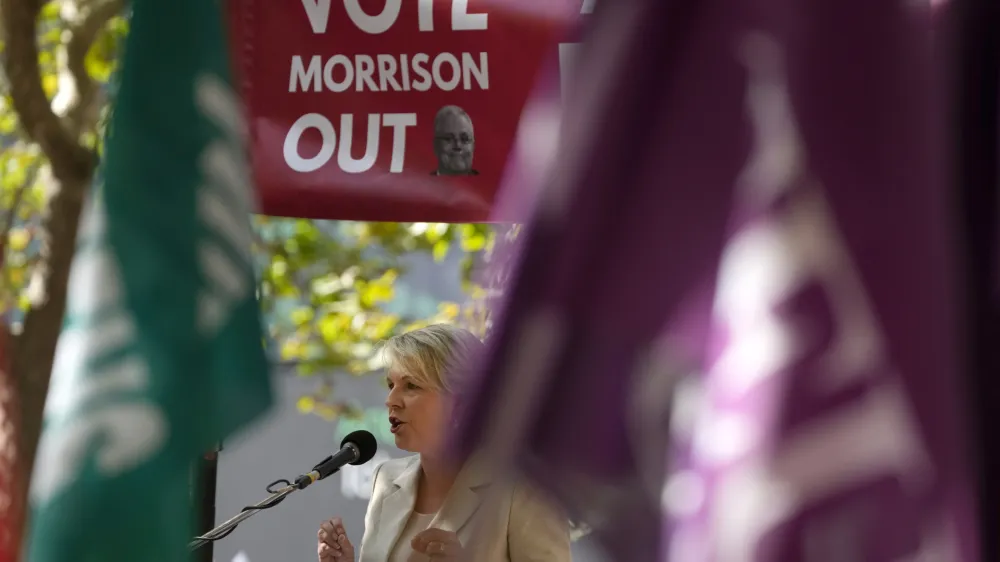 Tanya Plibersek, Labor Party shadow minister for education and shadow minister for women, speaks during the May Day rally in Sydney, Sunday, May 1, 2022. (AP Photo/Rick Rycroft)