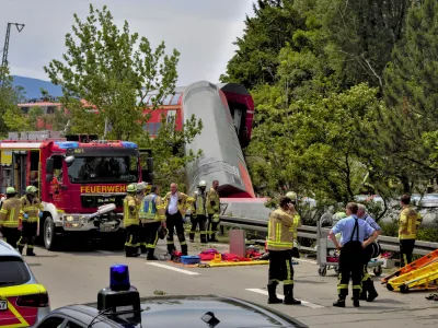 Numerous emergency and rescue forces are in action after a serious train accident in Garmisch-Partenkirchen, Germany, Friday, June 3, 2022. According to the authorities, at least three people have been killed and many injured. (Josef Hornsteiner/dpa via AP)