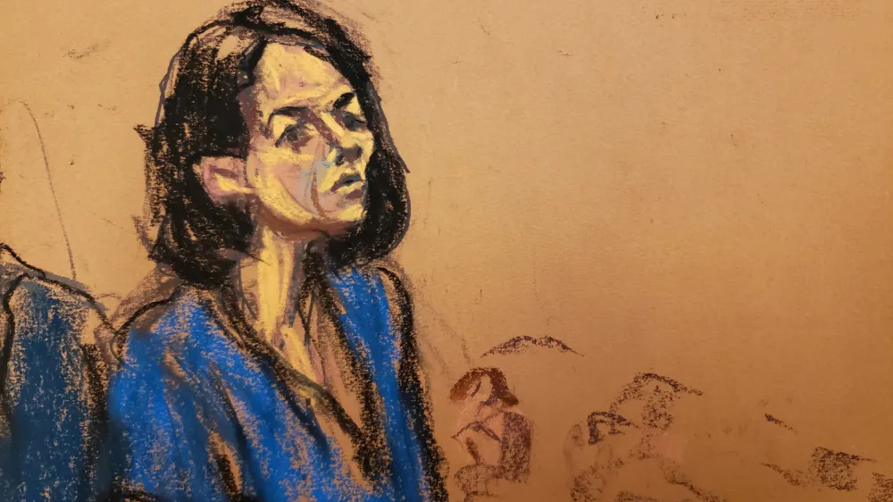 Jeffrey Epstein associate Ghislaine Maxwell stands at the podium to address Judge Alison Nathan during her sentencing in a courtroom sketch in New York City, U.S. June 28, 2022. Maxwell was convicted on December 29, 2021 on five of the six counts she faced for helping the late financier and convicted sex offender Jeffrey Epstein sexually abuse underage girls.  REUTERS/Jane Rosenberg