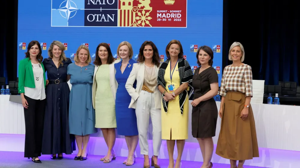 Canadian Foreign Minister Melanie Joly, British Foreign Secretary Liz Truss, European Parliament member Tanja Fajon, Norwegian Foreign Minister Anniken Huitfeldt, Sweden's Foreign Minister Ann Linde, Iceland's Foreign Minister Thordis Kolbrun Reykfjord Gylfadottir, German Foreign Minister Annalena Baerbock, Slovakia's President Zuzana Caputova and Belgium's Defence Minister Ludivine Dedonder, pose as they attend a roundtable discussion of Women Foreign and Defence Ministers from Allied countries, during a NATO summit in Madrid, Spain June 29, 2022. REUTERS/Yves Herman