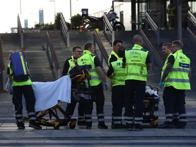 Emergency services at the Field's shopping center after a shooting, in Copenhagen, Denmark, Sunday, July 3, 2022. Danish police say several people have been shot at a Copenhagen shopping mall. Copenhagen police said that one person has been arrested in connection with the shooting at the Field's shopping mall on Sunday. Police tweeted that "several people have been hit" but gave no other details. (Olafur Steinar Gestsson/Ritzau Scanpix via AP)