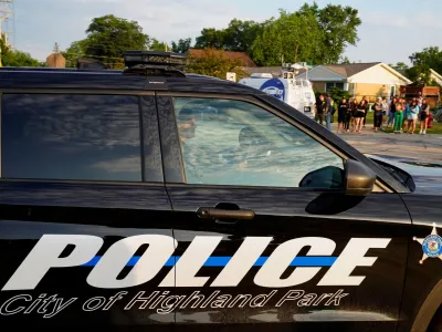 Police officers drive into the Highland Park Police station after a mass shooting at a Fourth of July parade route in the Chicago suburb of Highland Park, Illinois, U.S. July 4, 2022. REUTERS/Cheney Orr