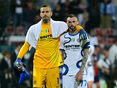 Soccer Football - Serie A - Cagliari v Inter Milan - Sardegna Arena, Cagliari, Italy - May 15, 2022 Inter Milan's Samir Handanovic with Marcelo Brozovic after the match REUTERS/Alberto Lingria