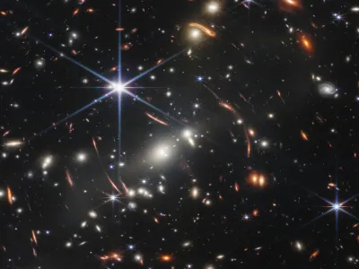 HANDOUT - 12 July 2022, ---, -: An image provided by NASA on 12 July 2022 shows the galaxy cluster SMACS 0723, captured by James Webb Space Telescope. The first image from NASA's new space telescope shows the deepest and sharpest image of the distant universe to date. The image known as Webb's First Deep Field shows galaxy cluster SMACS 0723 and is overflowing with detail. Photo: Space Telescope Science Institut/NASA/ESA/CSA/dpa - ATTENTION: editorial use only and only if the credit mentioned above is referenced in full