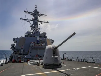 Arleigh Burke-class guided-missile destroyer USS Benfold (DDG 65), forward-deployed to the U.S. 7th Fleet area of operations, conducts underway operations in the South China Sea, July 19, 2022. U.S. Navy/Handout via REUTERS ATTENTION EDITORS - THIS IMAGE WAS PROVIDED BY A THIRD PARTY.
