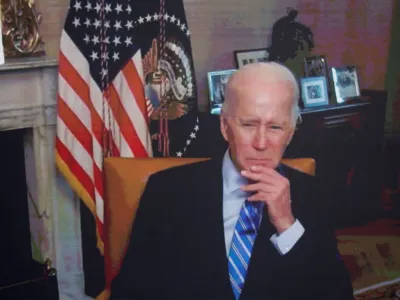 U.S. President Joe Biden, isolating following his COVID-19 diagnosis, appears virtually in a meeting with business and labor leaders about the Chips Act — relating to U.S. domestic chip and semiconductor manufacturing — in an auditorium on the White House campus in Washington, U.S., July 25, 2022. REUTERS/Jonathan Ernst