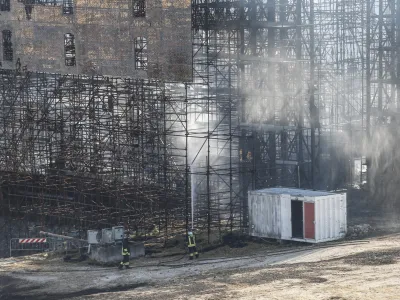 01 August 2022, Italy, Rome: Firefighters extinguish a fire at Medici and Big Brother studios in the Cinecitta movie city. Photo: Cecilia Fabiano/LaPresse via ZUMA Press/dpa