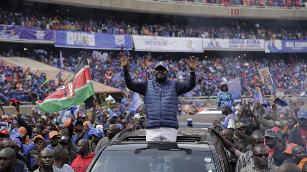 Kenyan presidential candidate Raila Odinga waves to his supporters as he arrives at his final electoral campaign rally in Kasarani stadium in Nairobi, Kenya Saturday, Aug. 6, 2022. Kenya is due to hold its general election on Tuesday, Aug. 9 as the East Africa's economic hub chooses a successor to President Uhuru Kenyatta. (AP Photo/Brian Inganga)