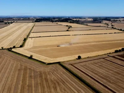 An aerial view of the harvest during the heatwave in Scampton, Lincolnshire, Britain, August 11, 2022. REUTERS/Carl Recine