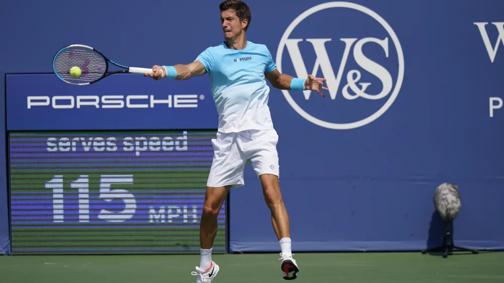 Aljaz Bedene, of Slovenia, returns a shot to Daniil Medvedev, of Russia, during the third round at the Western & Southern Open tennis tournament Tuesday, Aug. 25, 2020, in New York. (AP Photo/Frank Franklin II)