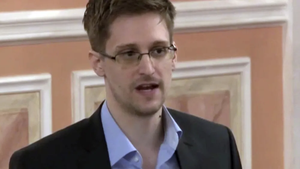 FILE - In this image made from video and released by WikiLeaks, former National Security Agency systems analyst Edward Snowden speaks in Moscow, Oct. 11, 2013. President Vladimir Putin has granted Russian citizenship to former U.S. security contractor Edward Snowden, according to a decree signed by the Russian leader on Monday Sept. 26, 2022. (AP Photo, File)